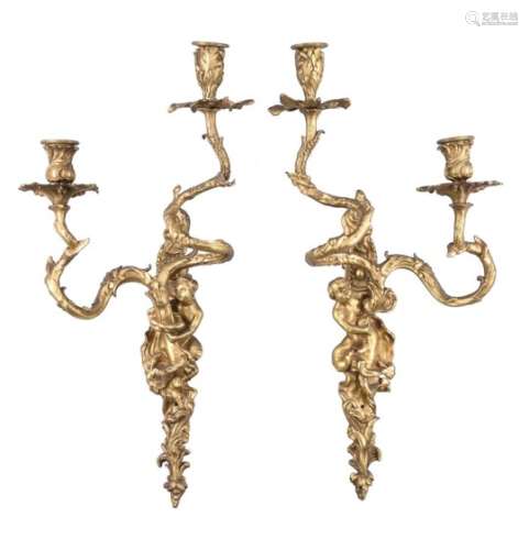 A set of four gilt bronze twin light figural wall appliques in Louis XV style