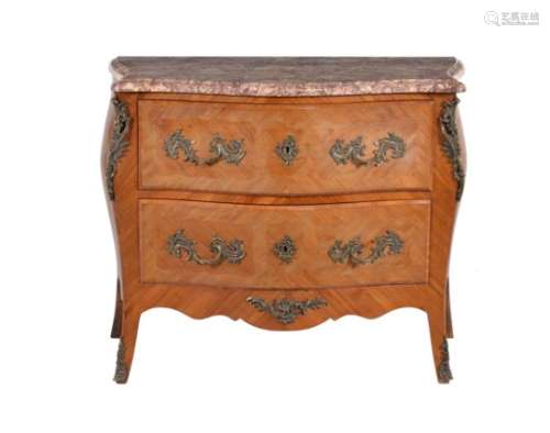 A Belgian walnut and gilt metal mounted commode in Louis XV style