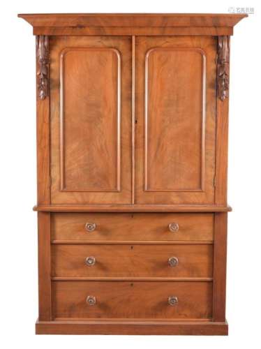 A Victorian flame mahogany linen press