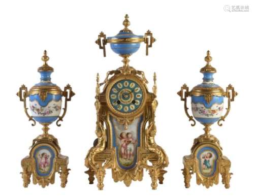 A French gilt spelter and Sevres style porcelain inset clock garniture