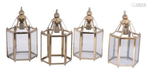 A set of four gilt metal and glazed hexagonal hall lanterns
