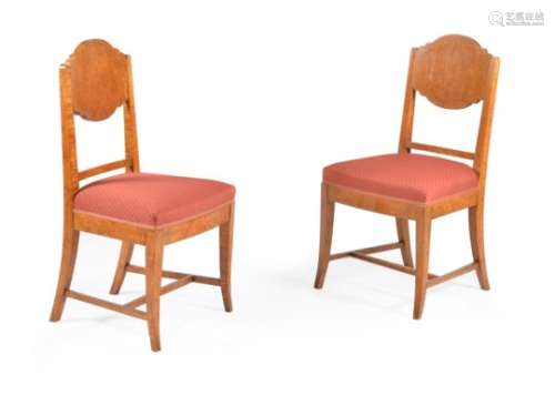 A set of eighteen Baltic karelian birch dining chairs