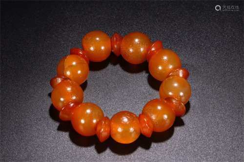 A Chinese carved Agate Beads