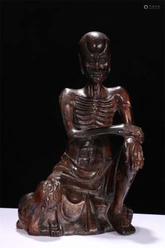 A Chinese Carved Agar-Wood Figure of Buddha