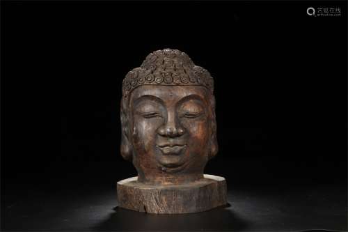 A Chinese Carved Zitan Buddha Head