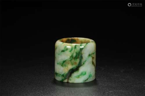 A Chinese Carved Jadeite Ring