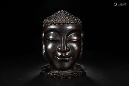 A Chinese Carved Zitan Buddha Head