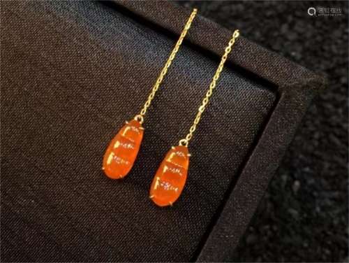 A Pair of Chinese Carved Yellow Gem Ear Rings