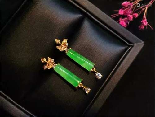 A Pair of Chinese Carved Jadeite Ear Rings