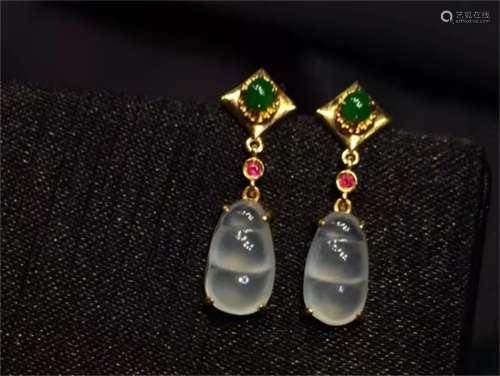 A Pair of Chinese Carved Jadeite Ear Rings