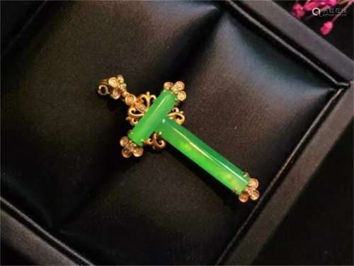 A Chinese Carved Jadeite Cross Pendant