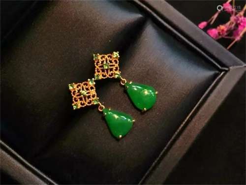 A Pair of Chinese Carved Jadeite Ear Rings