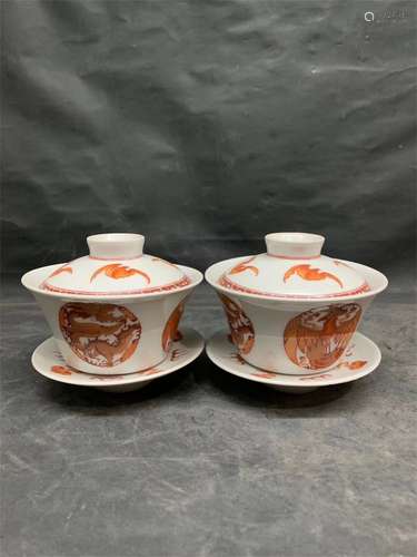 A Pair of Chinese Red Glazed Porcelain Tea Bowls with Covers and Plates