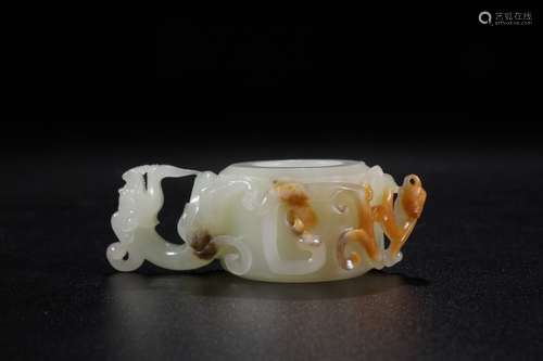 A Chinese Carved Jade Ring