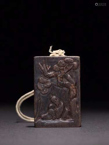 A Chinese Carved Agar-Wood Pendant