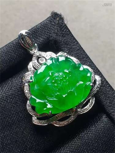 A Chinese Carved Jadeite Pendant