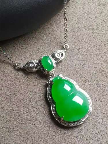 A Chinese Carved Jadeite Necklace