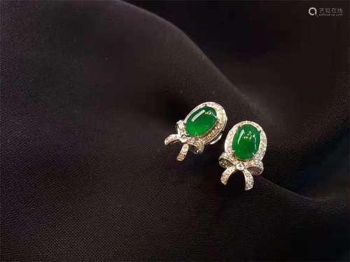 A Pair of Chinese Carved Jadeite Ear Rings