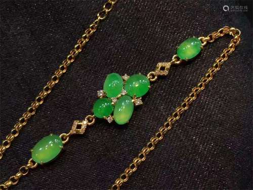 A Chinese Carved Jadeite Bracelet