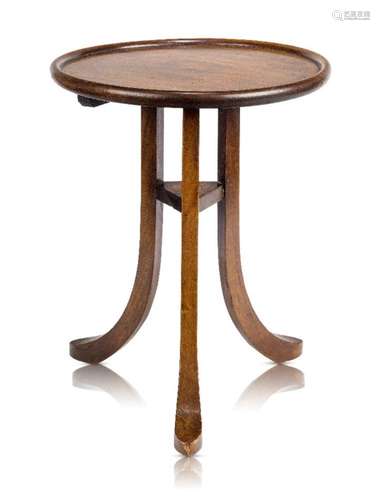 Liberty & Co, a 'Wylye' mahogany occasional table c.1904 Circular top, raised on three splayed