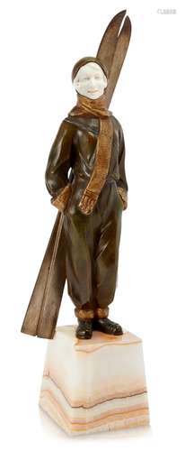 Louis Sosson (Act.1905-1930), a patinated and gilt bronze and ivory figure of a lady Skier c.1920,