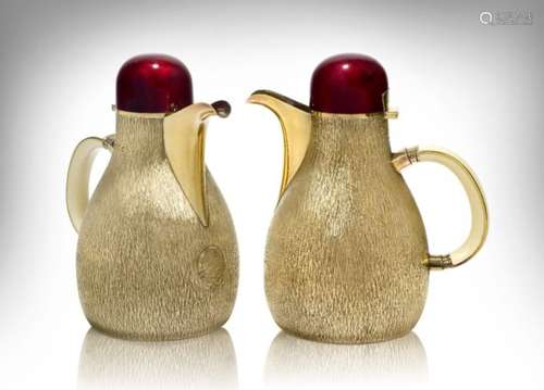 Gerald Benney (1930-2008), a pair of large silver gilt and enamel covered jugs ‘AGB’ mark of