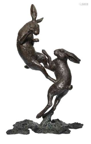 Michael Simpson (b.1951) British, a large bronze group 'Boxing Hares', edition 2/21, inscribed to