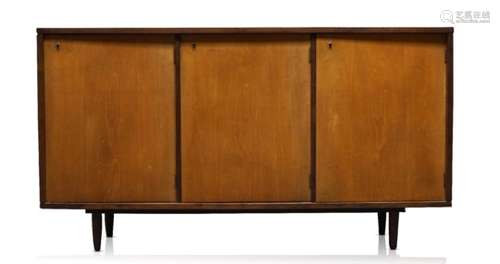 A Brazillian hardwood sideboard c.1960's of rectangular form, with three lockable cupboard doors,