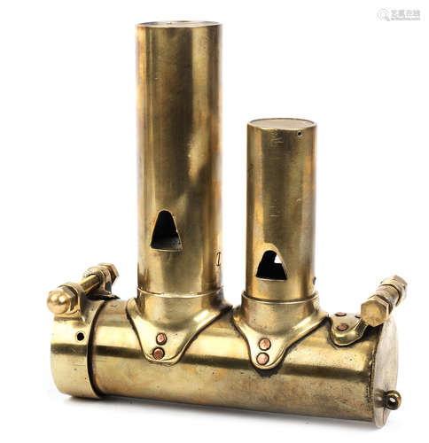 A brass two-tone exhaust whistle,