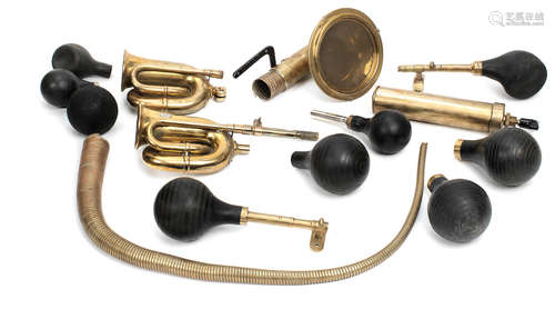 Assorted brass horn spares and bulbs,