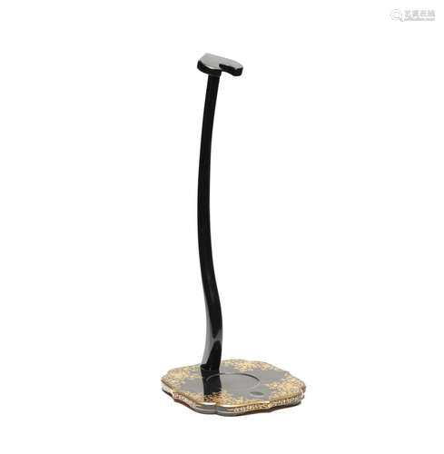 A black lacquer tachikake (sword stand)  By Uematsu Hobi (1872-1933), Taisho (1912-1926) or Showa (1926-1989) era, first half of the 20th century