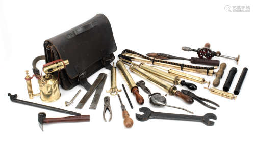 A tool kit suitable for a veteran or Edwardian motor car,