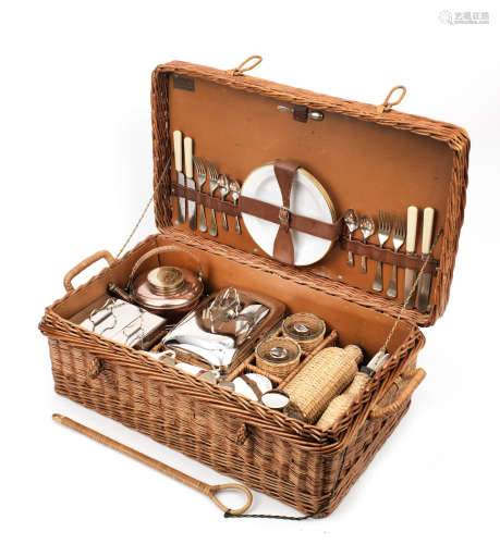 A 'Coracle' brand wicker-cased picnic set for four persons by G W Scott & Sons, circa 1909,