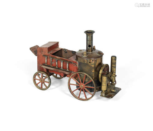11in (28cm) long  A painted metal and brass live-steam toy fire engine,  German, late 19th century,