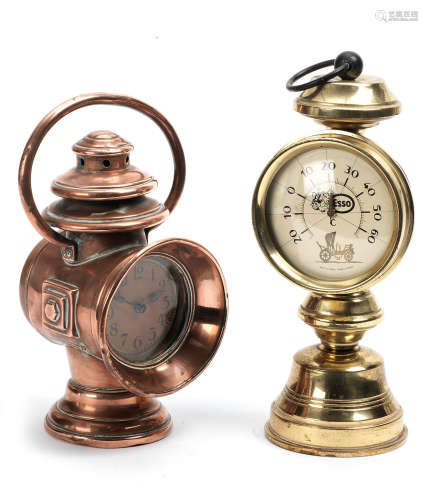 A desk clock and a barometer in the form of early motoring lamps,