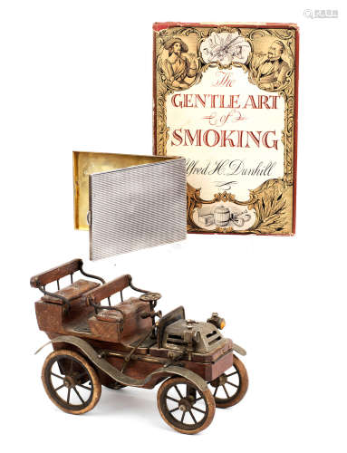 A smoker's companion in the form of an Edwardian motor car,
