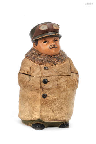 A rare full figure 'Chauffeur' ceramic tobacco humidor, believed French, circa 1905,