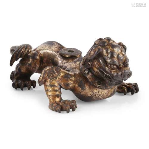 GILT-BRONZE CANDLE HOLDER OF A LION QING DYNASTY, 18TH-19TH CENTURY