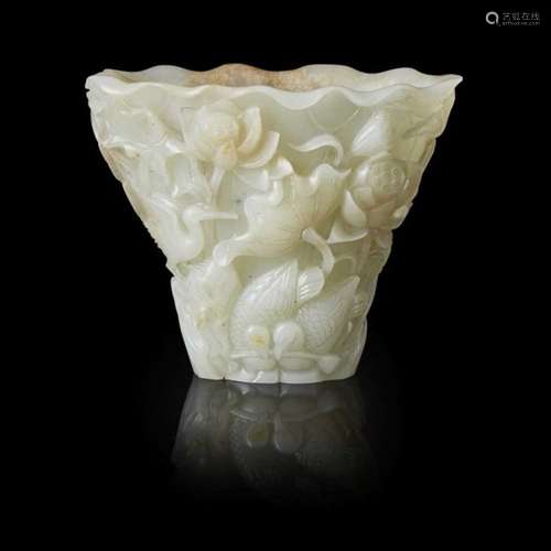 PALE CELADON JADE 'LOTUS POND' LIBATION CUP QING DYNASTY, 18TH-19TH CENTURY