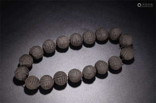 A Chinese Carved Agar-Wood Prayers Beads