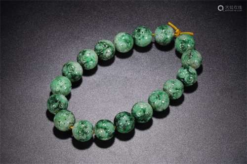 A Chinese Carved Jadeite Prayers Beads