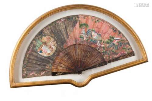A boxed fanPierced and relief tortoiseshell framePainted leaf depicting chinese daily scenesFramed