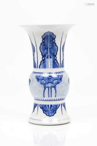 A tubular vaseChinese porcelainArchaic inspired blue underglaze decoration with taotie masks and