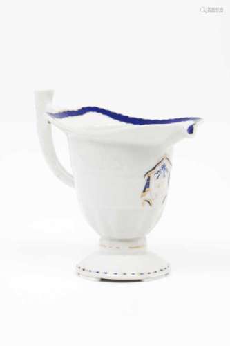 An inverted elm shaped sauceboatChinese export porcelainBlue and gilt decoration with shield and