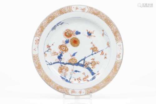 A large plateChinese export porcelainBlue, iron oxide and gilt decoration with floral bouquet,