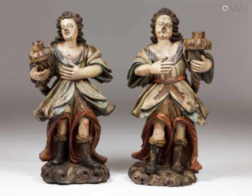 A pair of candle holding angelsPolychrome woodPortugal, 18th centuryHeight: 85 cm- - -15.00 %