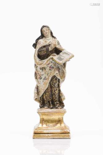 Saint Theresa of AvilaPolychrome and gilt terracotta sculpturePortugal, 18th/19th century(minor