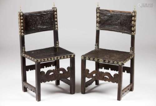 Two chairsChestnut with shaped and pierced railMetal tacks decorated seats and backsPortugal, 19th
