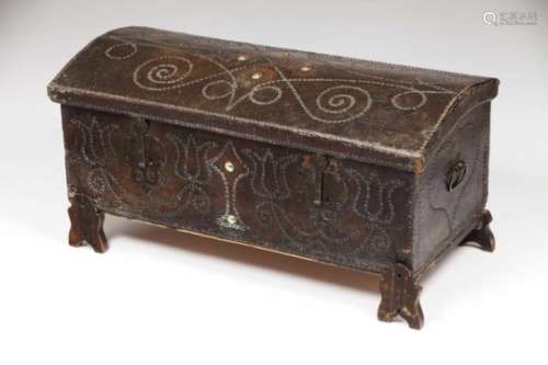 A trunkLeather coated woodYellow metal tacks decorationPortugal, 18th/19th century(losses and