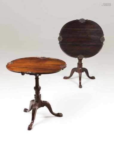 A pair of tripod tablesRosewood with carved decorationScalloped tilt-topsPortugal, 20th